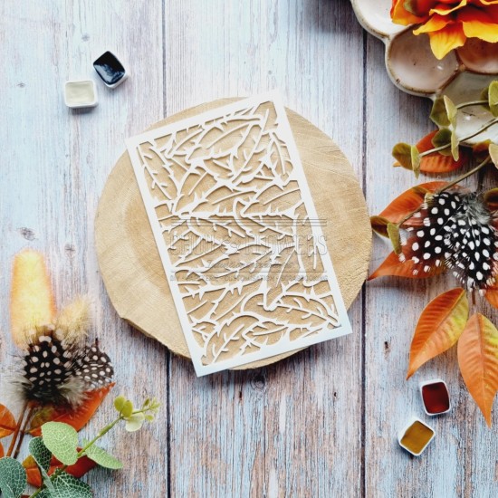 Pochoir plumes pour le scrapbooking et le mixed media
